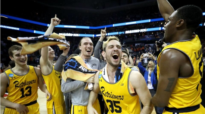 Swarming March Madness: AI Bracket Dominates the Crowd in Round 1